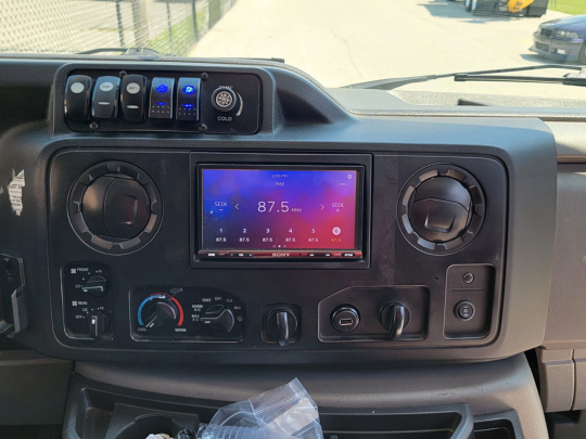 Showcasing the display on this Sony XAV-AX4000 Digital Multimedia Receiver in the limo bus dashboard.