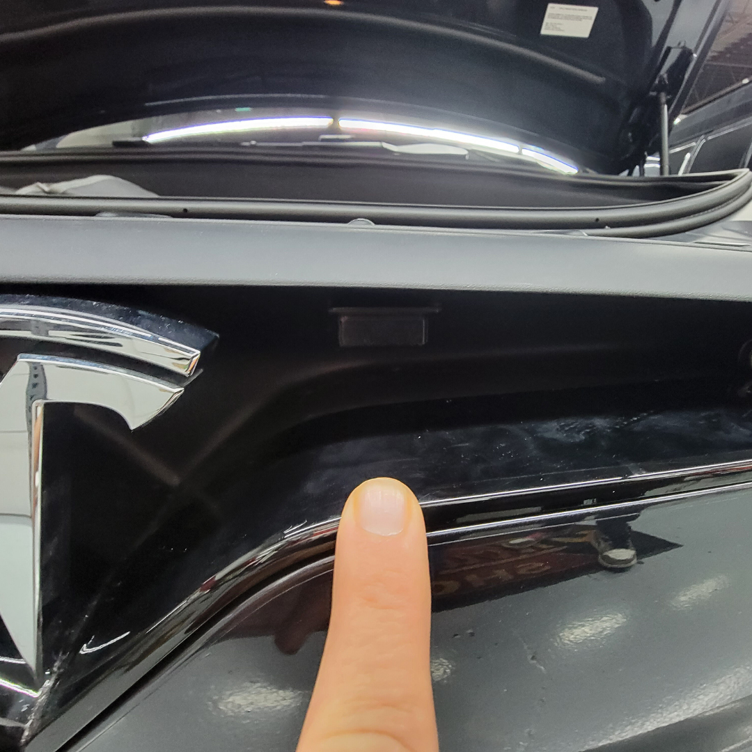 Front radar sensor installed in center grille of Tesla Model X.