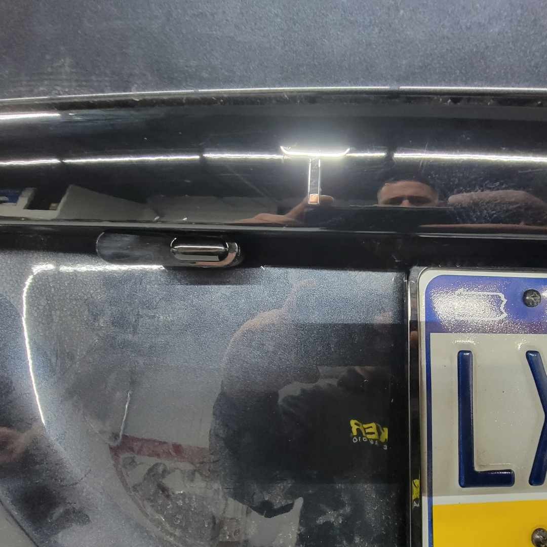Rear left AL Priority jammer integrated into bumper panel.